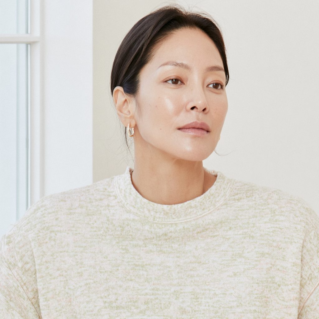 A Korean woman radiating calm positive energy in